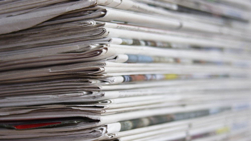 Stacked newspapersVARIOUS