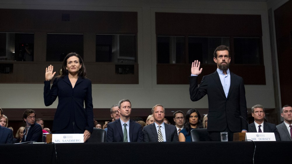 Facebook COO Sheryl Sandberg, left, accompanied by Twitter CEO Jack Dorsey are sworn in before the Senate Intelligence Committee hearing on 'Foreign Influence Operations and Their Use of Social Media Platforms' on Capitol Hill, in WashingtonCongress Social Media, Washington, USA - 05 Sep 2018