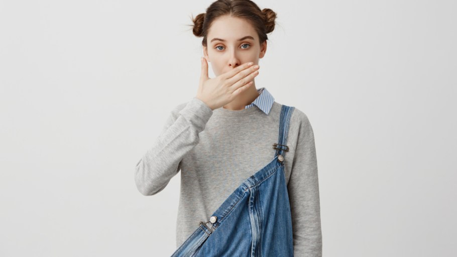 person covering mouth