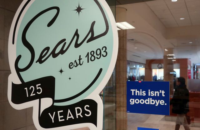 In this Nov. 2, 2018 photo, a sign in the window at Sears promises that "This isn't goodbye," at the Livingston Mall in Livingston, N.J. Sears is closing 80 more stores as it teeters on the brink of liquidation. The 130-year old retailer set a deadline of for bids for its remaining stores to avert closing down completelySears, Livingston, USA - 02 Nov 2018