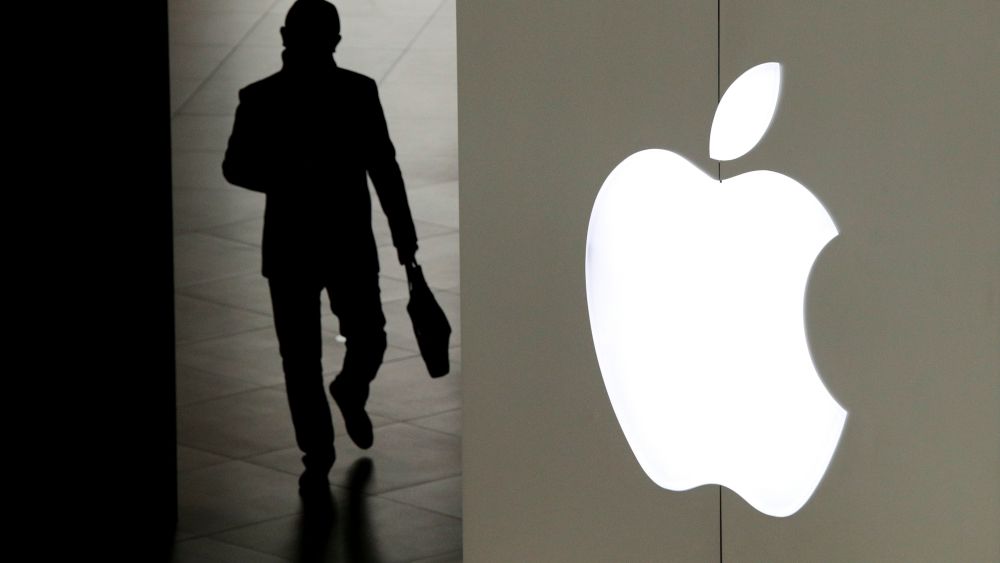 A man leaves an Apple store in Beijing, . Apple Inc.'s $1,000 iPhone is a tough sell to Chinese consumers who are jittery over an economic slump and a trade war with Washington. The tech giant became the latest global company to collide with Chinese consumer anxiety when CEO Tim Cook said iPhone demand is waning, due mostly to China. Weak consumer demand in the world's second-largest economy is a blow to industries from autos to designer clothing that are counting on China to drive revenue growthApple Consumer Slump, Beijing, China - 03 Jan 2019