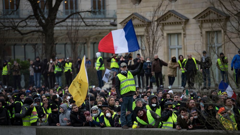 Protesters walk alongside the Seine river during a 'Yellow Vests' protest in Paris, France, 05 January 2019. The so-called 'gilets jaunes' (yellow vests) is a grassroots protest movement with supporters from a wide span of the political spectrum, that originally started with protest across the nation in late 2018 against high fuel prices. The movement in the meantime also protests the French government's tax reforms, the increasing costs of living and some even call for the resignation of French President Emmanuel Macron.Yellow vests protest in Paris, France - 05 Jan 2019