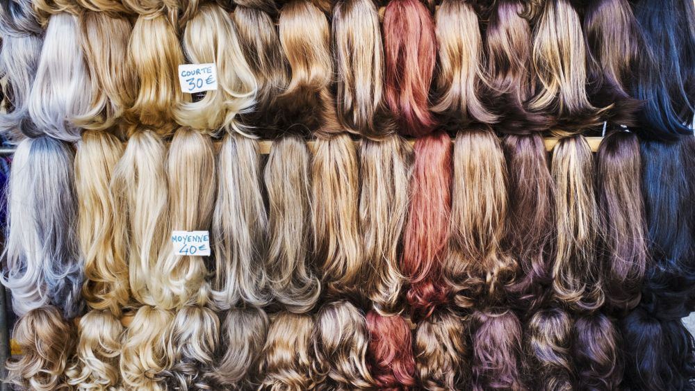 A display of hair extensions and hair pieces of different colours.VARIOUS