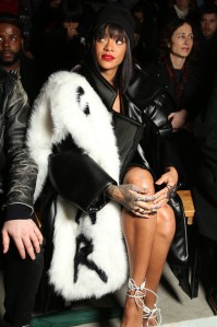 Rihanna in the front row at the Comme des Garcons RTW Fall 2014 show in Paris.