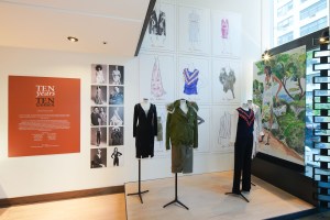 The anniversary capsule collection resides near the entrance, along with portraits of the women who selected its 10 items.