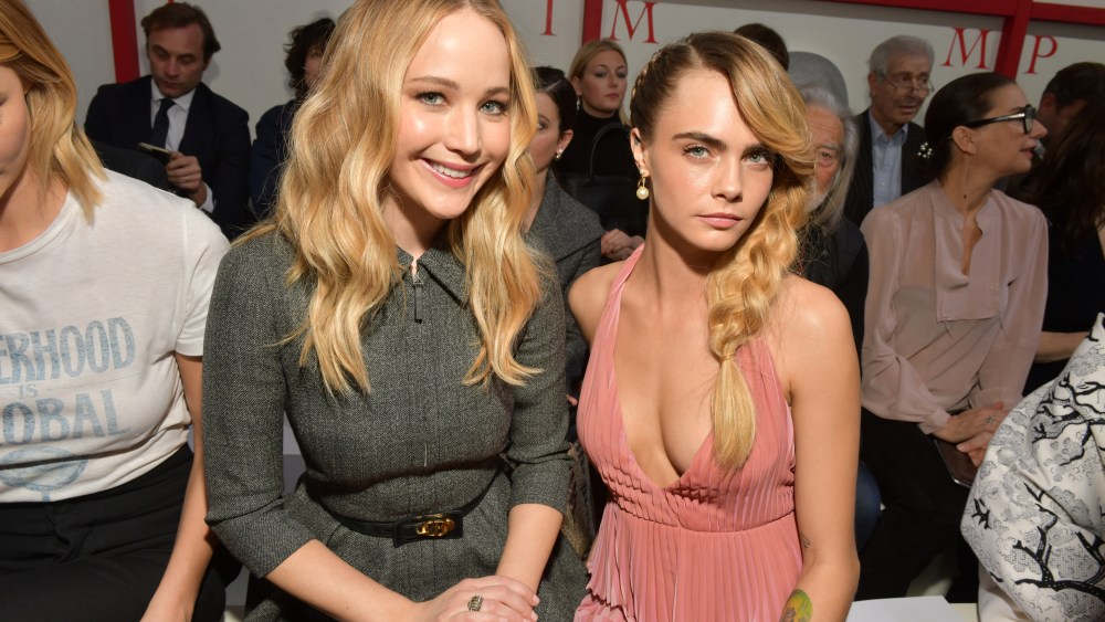 Jennifer Lawrence and Cara Delevingne at Christian Dior RTW Fall 2019, photographed in Paris on February 26, 2019.