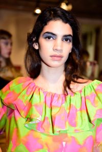 Hair: ModelsÕ locks were styled in knots that were seemingly falling apart. ÒI didnÕt use products,Ó said hairstylistÊTamara McNaughton. "I know thatÕs blasphemy, but I think itÕs more using the girlsÕ natural texture. When you put products on, it seals everything down and we wanted to see the realness of all of this. Having clean hair was the most important.Ó Ñ Alexa Tietjen