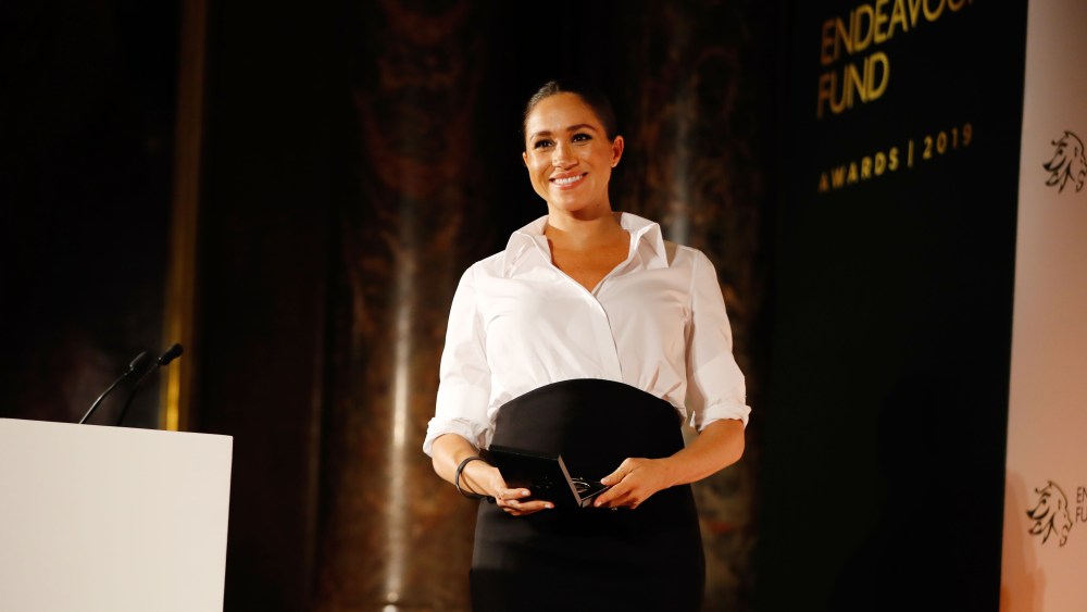 Meghan Duchess of Sussex presents the Celebrating Excellence Award to Nathan Forster, a former soldier of the Army's Parachute Regiment, at the annual Endeavour Fund Awards at Draper's Hall.Endeavour Fund Awards, London, UK - 07 Feb 2019