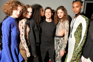 Casey Cadwallader with models backstage
