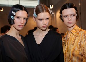 Pat McGrath opted for a natural yet edgy look for the show. The focus was on skin, which she perfected applying ultralight foundation and concealer where needed. Lashes were curled while eyebrows were bleached and groomed. Slightly paled-down lips finished off the look.ÊÑ Sandra Salibian