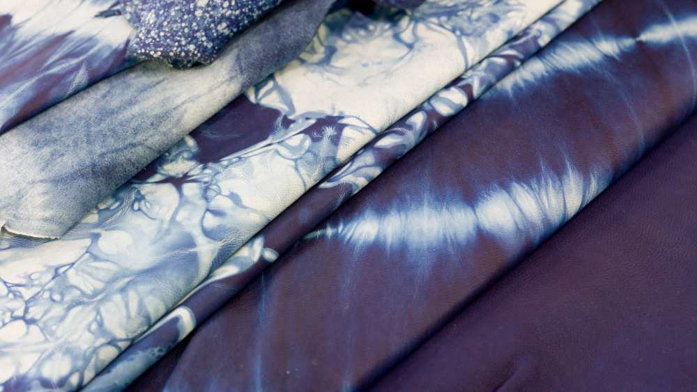 Indigo-dyed leathers using kimono techniques by Sukumo Leather.