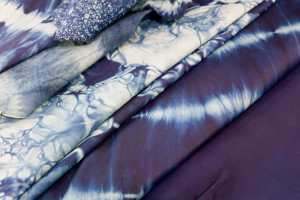 Indigo-dyed leathers using kimono techniques by Sukumo Leather.