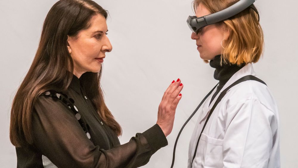 Marina Marina Abramovic with a technicianMarina Abramovic: The Life exhibition, London, UK - 18 Feb 2019Marina Abramovic: The Life at the Serpentine Gallery, a perfomance in Mixed Reality (a wearable augmented experience). The piece, lasting 19 minutes, builds on the artist?s long-standing fascination with the notion of material absence. The use of Mixed Reality allows AbramoviÄ? to explore how to use her own body as subject and object, mapping new territory at the intersection of technology and performance. The Life is produced by Tin Drum, a US/UK studio that works exclusively in Mixed Reality. It runs from 19 - 24 February 2019