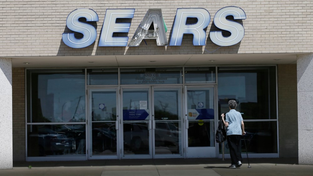 An elderly woman walks outside a Sears retail store scheduled to be shut down in north DallasSears, Dallas, USA - 23 Mar 2017