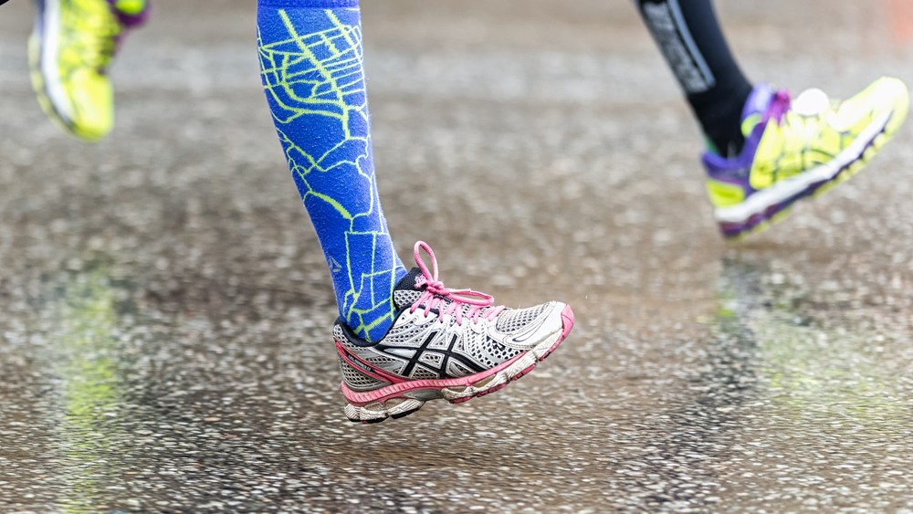 Asics running shoes in a marathon