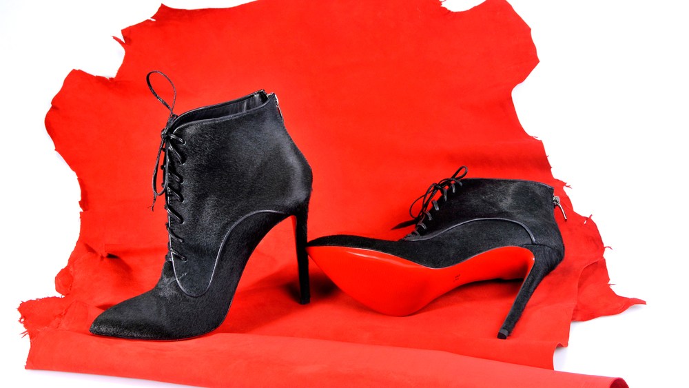 Christian Louboutin Successfully Defends Red Bottom Patent in EU Court