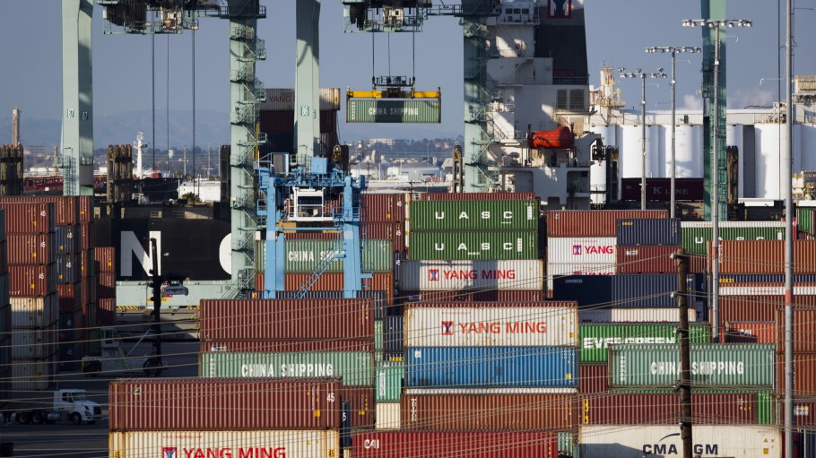 Cranes load and unload shipping containers at the Port of Los Angeles in Los Angeles, California