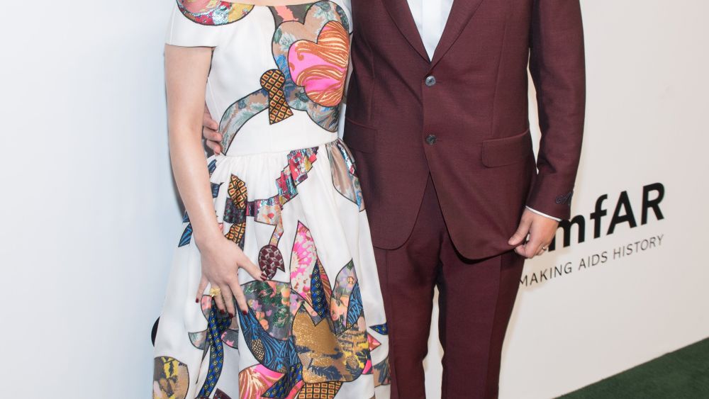 Adrian Cheng and wife, Jennifer Yu on the amfAR red carpet.