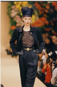 Kate Moss - Model - 1993 Looking Sleek And Sophisticated On The Catwalk Although Away From The Fashion Shows Kate Prefers Jeans And Trainers To Designer Outfits Calvin Klein Gave Kate Moss An Elegant Black Evening Dress For Her 19th Birthday. She Wore It With Trainers. Her Mother Linda Was Mortified: 'imagine. That Beautiful Dress And She Ruined It By Wearing Trainers. He Must Have Been Horrified ' She Says.... 
Kate Moss - Model - 1993 Looking Sleek And Sophisticated On The Catwalk Although Away From The Fashion Shows Kate Prefers Jeans And Trainers To Designer Outfits Calvin Klein Gave Kate Moss An Elegant Black Evening Dress For Her 19th Birthday. She Wor