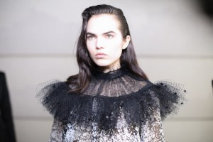Anthony Turner had in mind, when conceiving the hairstyle for the Giambattista Valli show, a Parisian woman who has been on a journey of self-exploration, traveling around the world. ÒBut now sheÕs back, with a vengeance,Ó he said, describing her look as one of Òundone glamour.Ó Turner used LÕOral Paris products, including a mousse that he applied to modelsÕ hair to make it matte, added a low side part, dried tresses with fingers and bent them with a curling iron. Ò[ThereÕs] a little bit of height through the top,Ó he said. A spritz of Elnett followed and a wide-tooth comb created some marks. ÒI feels a little bit androgynous,Ó said Turner, adding that the few models sporting a more decorated eye would get a simple ponytail. Ñ Jennifer Weil