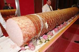Guests snacked on pieces of a giant mortadella.