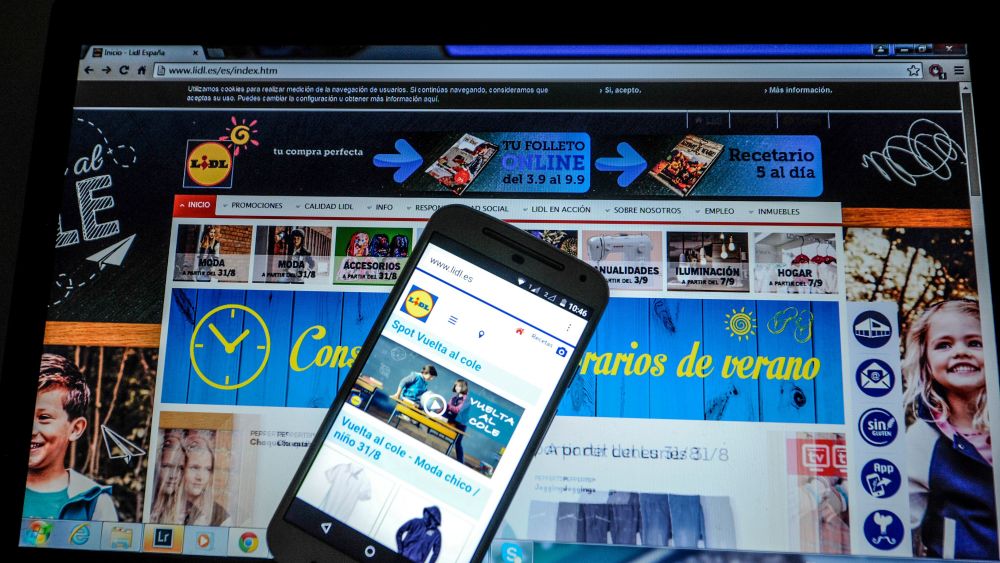 Computer screen and phone screen showing a retailer's webpage