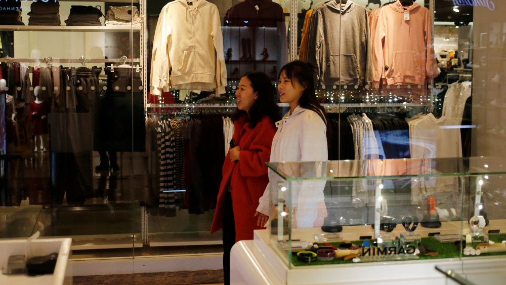 Consumers in a Beijing mall.