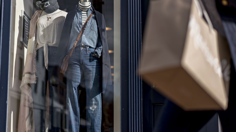 A pedestrian passes in front of a J. Crew Group Inc. Madewell store in the Georgetown neighborhood of Washington, D.C., U.S.