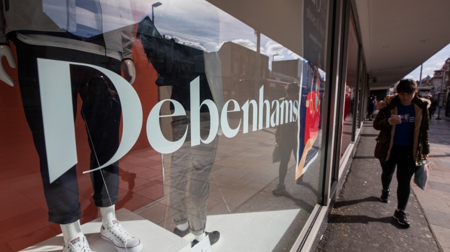 A pedestrian passes a Debenhams Plc department store in London, U.K., on Monday, March 11, 2019.
