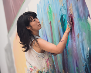 A whirlwind of color invaded the Anteprima shop thanks to Japanese artist Ellie Omiya. In collaboration with Corvasce Design, an eco-friendly Italian company that produces cardboard furniture, the event hosted a live performance where the artist painted different pieces in a fun and cheerful style. “I found that the Milano Design Week is becoming more collaborative with art, much more than before; before it was just about furniture, or lighting, but these days everybody is collaborating with artists, and I really like that,” Anteprima’s founder and designer Izumi Ogino said. “As a fashion designer I can see how some of the trends we are spotting are also reflected in furniture, like the 70’s to 90's’ influence and color green, which everybody is using.”