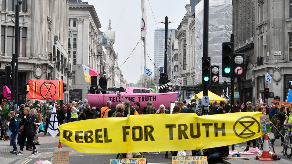 Protesters from the Extinction Rebellion campaign group block Oxford Circus in central London, Britain, 16 April 2019. The Extinction Rebellion are holding a number of protests across London to draw attention to climate change.Climate Change protests across London, United Kingdom - 16 Apr 2019