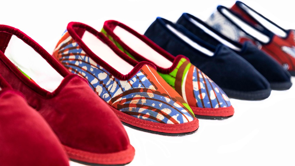 The Papusse velvet slippers created with wax printed cotton for Yoox.