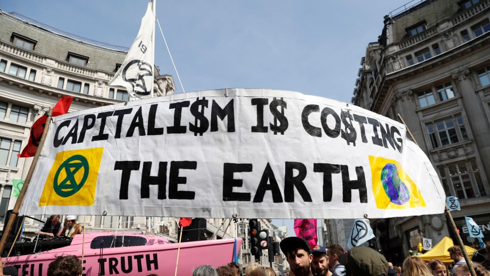 Protesters take part holding placards during a climate change demonstration in London, . Extinction Rebellion have organised a nationwide week of action, they are calling for a full-scale Rebellion to demand decisive action from governments on climate change and ecological collapse. They plan to engage in acts of non-violent civil disobedience against governments in capital cities around the worldClimate Protest, London, United Kingdom - 15 Apr 2019