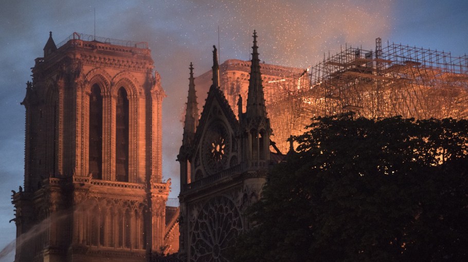 Flames and smoke rise from a fire at Notre-Dame Cathedral in Paris, France, on Monday, April 15, 2019