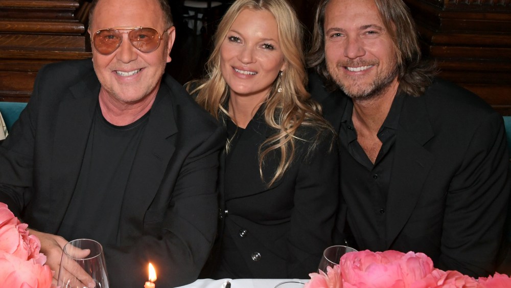 LONDON, ENGLAND  - MAY 09: (L to R) Michael Kors, Kate Moss and Lance LePere attend a private dinner hosted by Michael Kors to celebrate the new Collection Bond St Flagship Townhouse opening on May 9, 2019 in London, England. (Photo by David M. Benett/Dave Benett/Getty Images for Michael Kors)