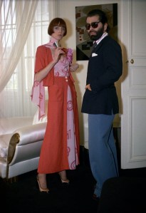 A model wearing pink dress from the Chloe Spring RTW 1974 collection with Karl Lagerfeld.