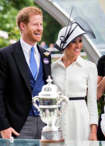 Prince Harry and Meghan Duchess of Sussex present the prize in the St James's Palace stakes to Frankie Dettori.Royal Ascot, Day One, UK - 19 Jun 2018