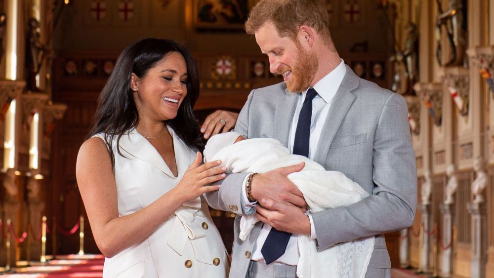 Prince Harry and Meghan Duchess of Sussex with their baby son during a photocall in St George's Hall at Windsor Castle in Berkshire