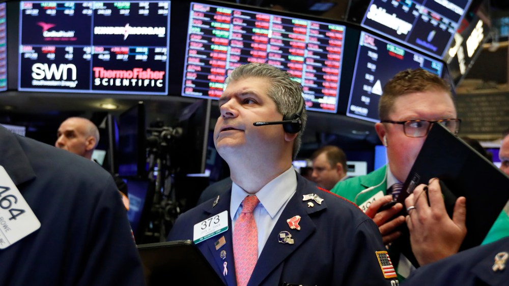 John Panin, Ryan Falvey. Traders John Panin, center, and Ryan Falvey, right, work on the floor of the New York Stock Exchange, . Stocks are opening broadly lower on Wall Street as investors keep a close eye on trade talks between the U.S. and ChinaFinancial Markets Wall Street, New York, USA - 09 May 2019