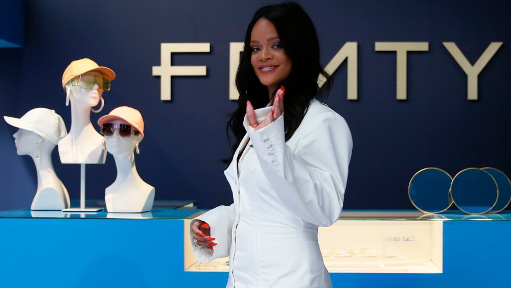 Rihanna poses as she unveils her first fashion designs for Fenty at a pop-up store in Paris, France.