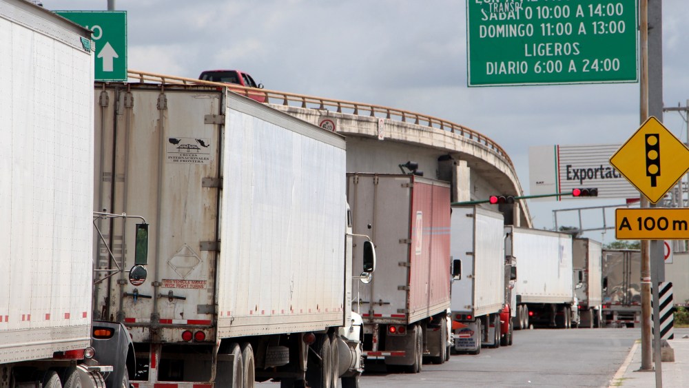 Mexican trucks that mainly transport automotive products await their turn to access the United States through the Ignacio Zaragoza International Bridge, in Matamoros, Tamaulipas, Mexico, 31 May 2019. Mexican President Andres Manuel Lopez Obrador maintained the offer of dialogue before the announcement by US President Donald J. Trump to impose taxes on all Mexican products if it does not control the migratory flow.Mexico maintains diplomacy with the United States despite the fear of a trade war, Matamoros - 31 May 2019
