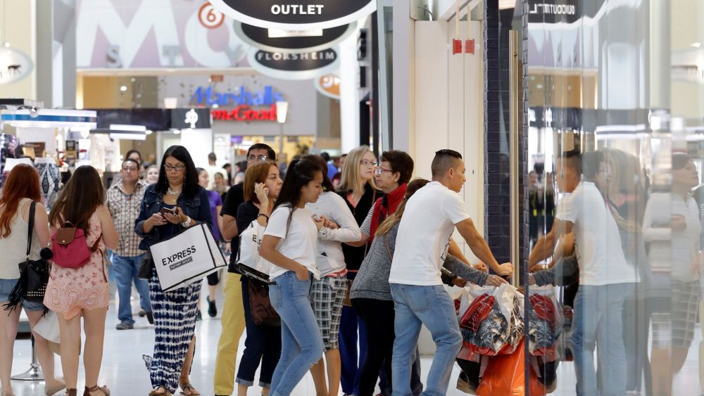 Shoppers shop at the Dolphin Mall on Black, in Miami. Stores open their doors Friday for what is still one of the busiest days of the year, even as the start of the holiday season edges ever earlierHoliday Shopping Black Friday, Miami, USA - 25 Nov 2016