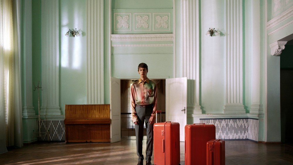 A campaign image for Rimowa’s new range of colored suitcases