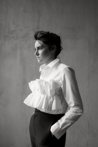 Comme Des GarconsÕ cotton shirt (available at Saks Fifth Avenue); Common OddsÕ polyester, viscose and elastane trouser; Shihara earrings.