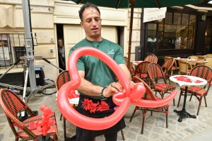 A balloon-maker at the Louis Vuitton show