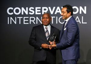H.E. Dominggus Mandacan and Dr. M. Sanjayan