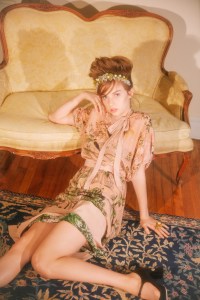 Red Valentino’s silk dress. Simone Rocha tiara; Miu Miu mary janes.