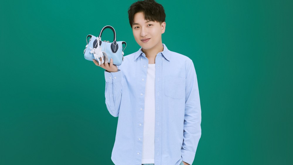 Tao Liang with the new unicorn handbag