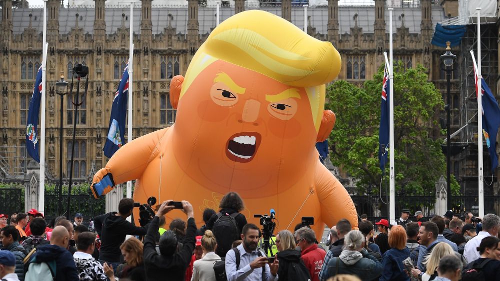 Anti Trump protesters with a Trump baby blimp flying over Parliament Square gather for a protest against US President Donald J. Trump State visit to the UK in London, Britain, 04 June 2019. US President Trump and First Lady Trump are on a three-day official visit to Britain.Anti Trump protests during State visit of US President Donald J. Trump to United Kingdom, London - 04 Jun 2019