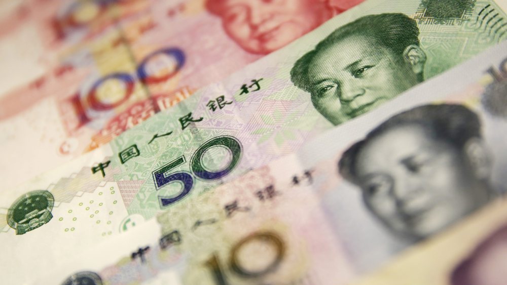Chinese Yuan Or Renminbi (rmb) Notes in Beijing China 29 December 2015 China's Currency Fell to Its Weakest in More Than Four and a Half Years on 29 December 2015 the Yuan Also Known As the Renminbi Dropped 114 Basis Points to 6 4864 Against the Us Dollar on 29 December Its Weakest Since June 2011 According to Data From the China Foreign Exchange Trading System China BeijingChina Currency - Dec 2015